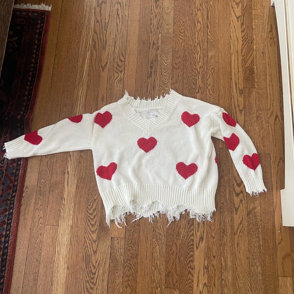 Worn once heart sweater! Great quality and perfect for Valentine’s Day!
